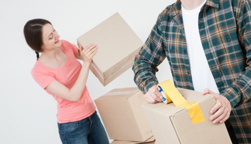 Unpacking service helping a family settle into a new home